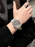 SHEIN This Fashionable Transparent Back Diamond Ladies' Wristwatch Features A Rotatable Starry Dial Design, Stainless Steel Case, White Leather Strap