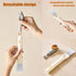 Detachable spatula tool with a spatula attachment and a brush attachment on a beige background.