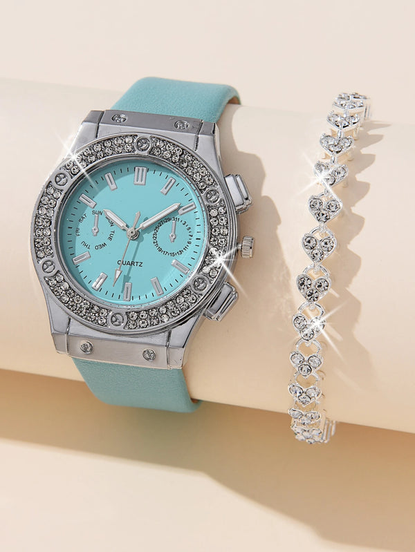 Turquoise watch with silver accents and a matching bracelet on a beige background