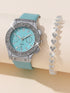 Turquoise watch with silver accents and a matching bracelet on a beige background