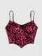 Pink leopard print top on a light gray background