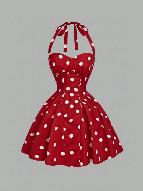 Red polka dot dress on a gray background