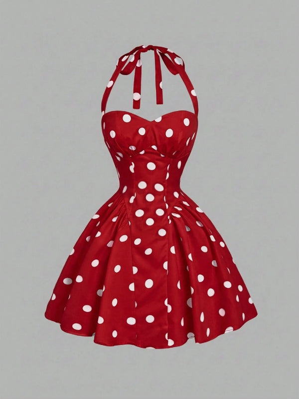 Red polka dot dress on a gray background
