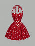 Red polka dot dress on a gray background