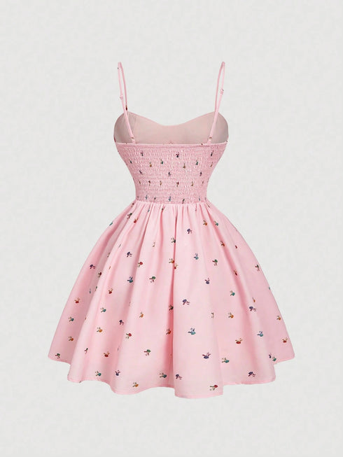 Pink dress with floral pattern on a light gray background