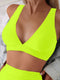Neon green sports bra worn by a person