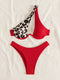 Red bikini with leopard print top on a light background