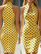 A yellow bodycon dress with black polka dots, shown from both the front and back on a model. The dress features a high halter-style neckline with a square cutout at the chest.