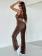SHEIN Women's slim-fit jumpsuit with a leopard print and wide straps0