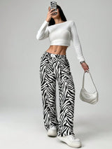 بنطلون واسع أبيض وأسود بطبعة زيبرا من قماش منسوج – SHEIN EZwear