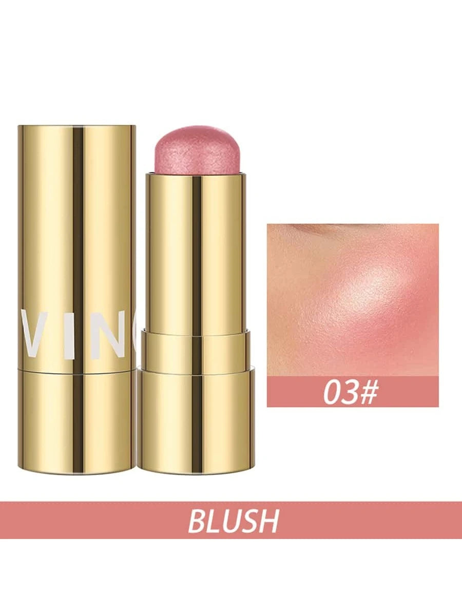 A gold cosmetic blush stick shown open next to its cap, with a swatch of the pink blush shade and the text 'BLUSH' and '03#' on a white background.