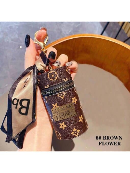 SHEIN 1pc Portable Coin Pouch & Car Keychain, Mini Fashionable Key Ring Casual flower shape (Brown)